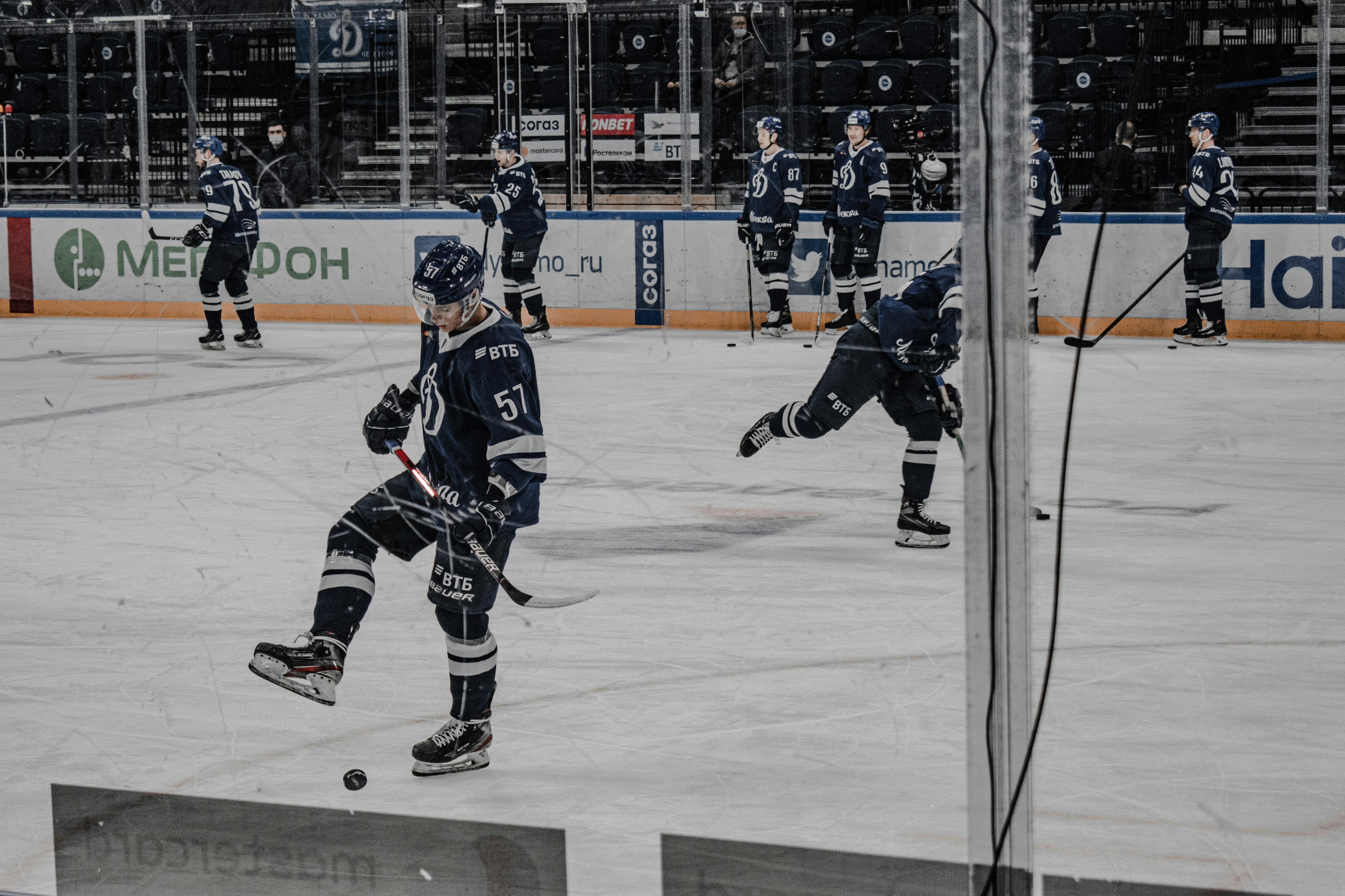 ice hockey players on ice hockey field